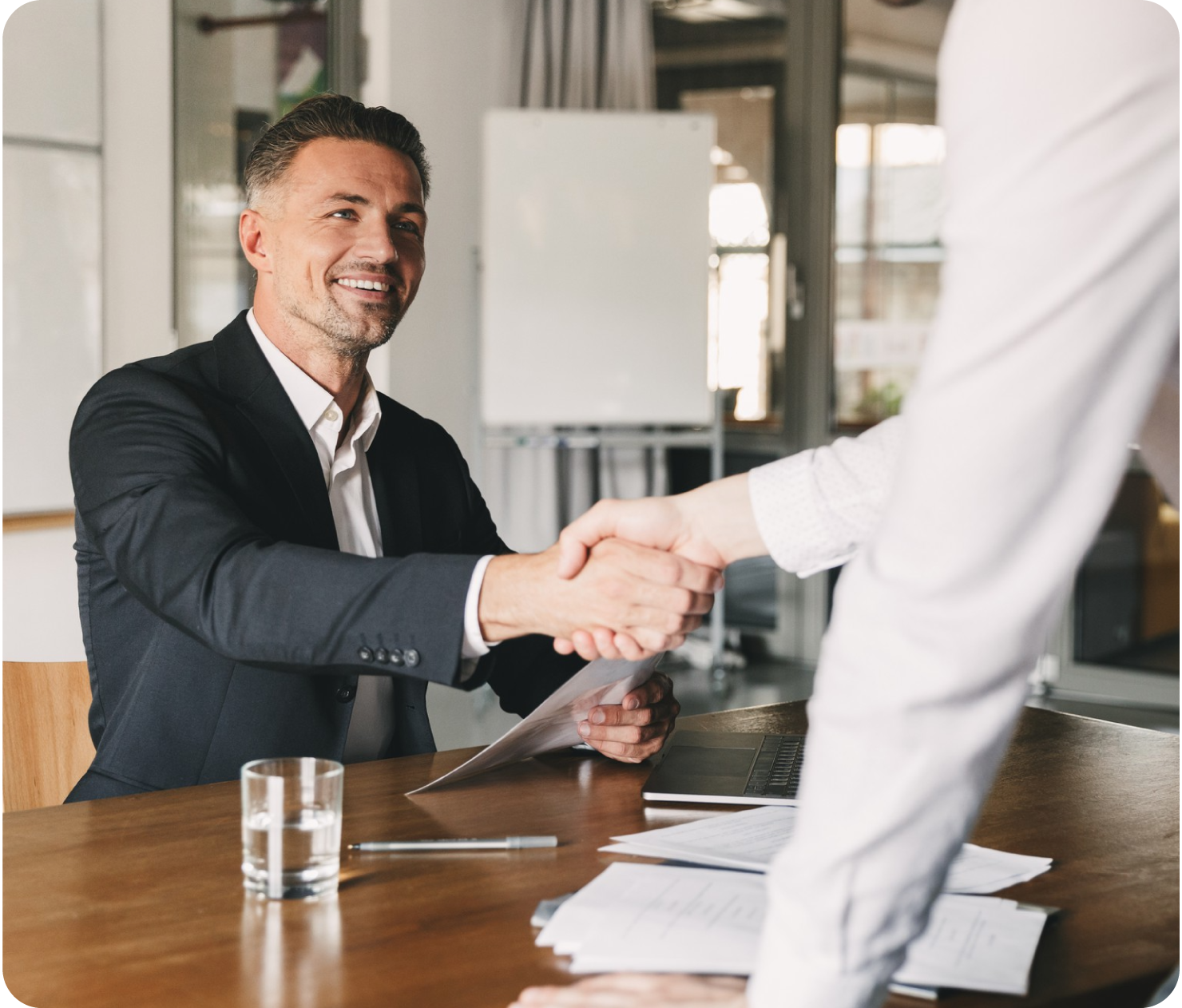 Foto de mano con bolígrafo